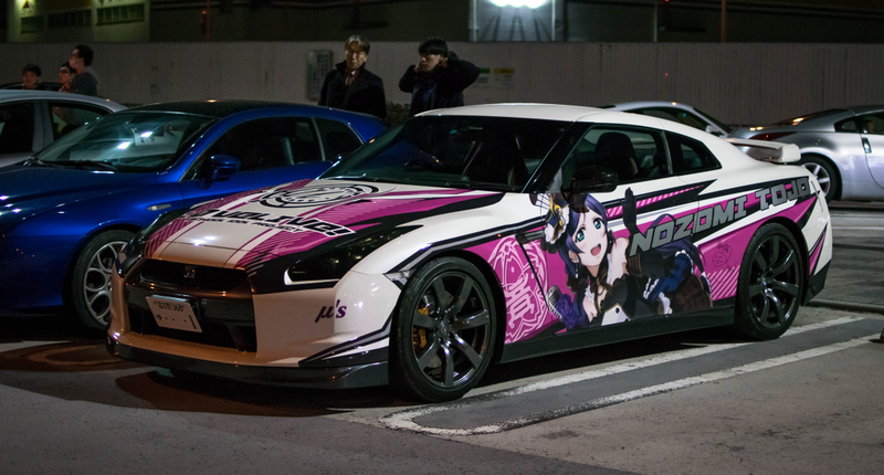 Illustration for article titled This Parking Lot In Tokyo Will Bring All Your Car Fantasies To Life